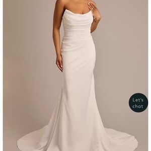 Strapless draped satin mermaid wedding dress